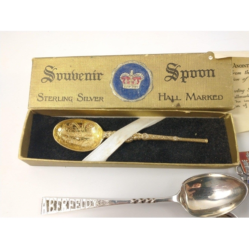 84 - Nine silver hallmarked collectors' spoons from around the UK, gross weight 110g plus a boxed sterlin... 