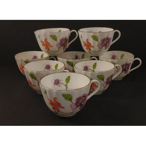 99 - A ROYAL WORCESTER Astley dinner service to include 8 teacups, 6 large cups, 8 saucers (15cm), 8 plat... 