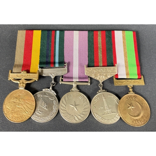 100 - A Group of five PAKISTAN MEDALS, comprising 1998 Nuclear Test Chagai Medal, A.H.1422 Escalation 2001... 