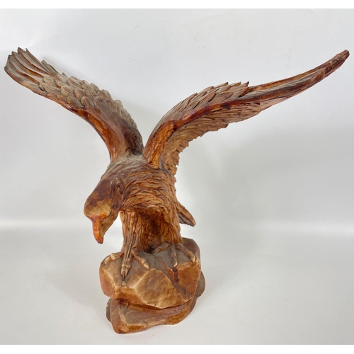 183 - A composite golden eagle ready for take-off stands 30cm tall, no chips#51