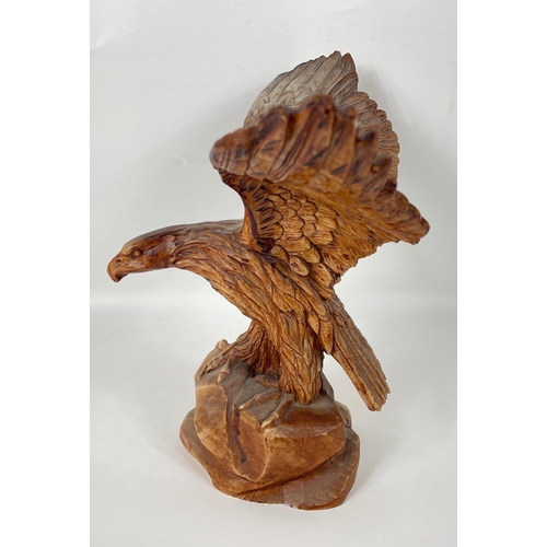 183 - A composite golden eagle ready for take-off stands 30cm tall, no chips#51