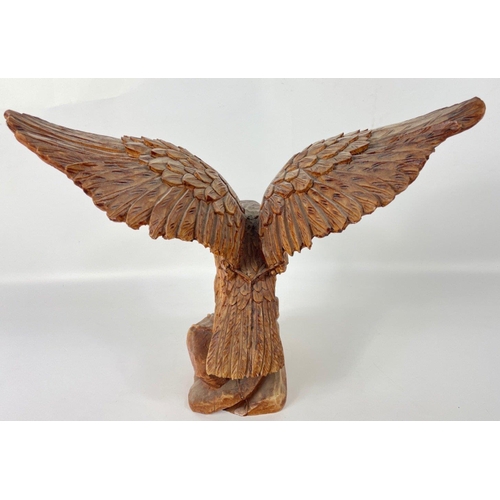 183 - A composite golden eagle ready for take-off stands 30cm tall, no chips#51