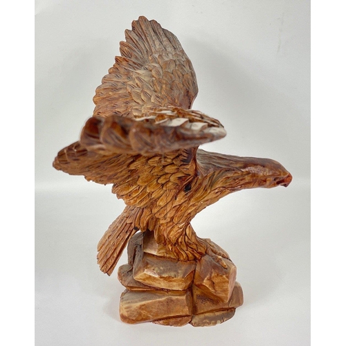 183 - A composite golden eagle ready for take-off stands 30cm tall, no chips#51