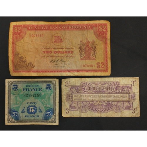 84 - VINTAGE BANK NOTES to includeA 2$ Reserve Bank of Rhodesia June 1973 in worn and creased condition, ... 