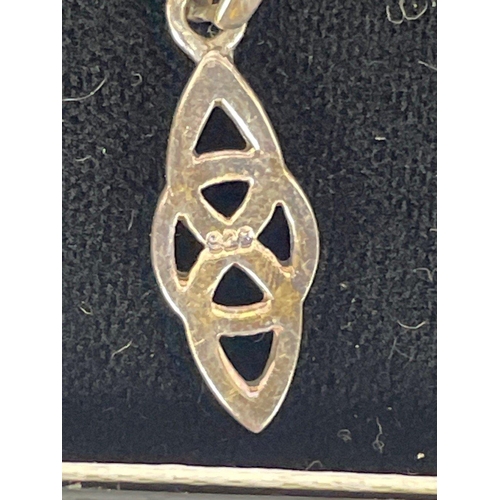 20 - 'CELTIC LANDS' made boxed 925 stamped pendant on a 925 stamped chain weight 7.32g approx with also a... 