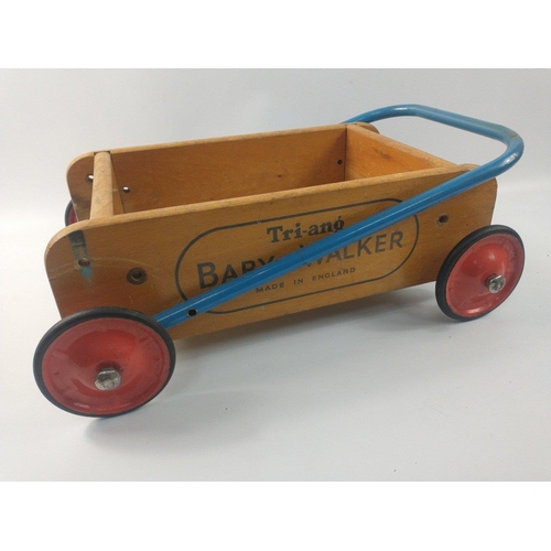 224 - A VINTAGE c1960's TRI-ANG Baby Walker 40cm x 25cm approx with a pull-along building bricks small car... 