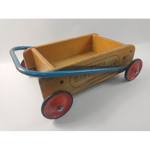 224 - A VINTAGE c1960's TRI-ANG Baby Walker 40cm x 25cm approx with a pull-along building bricks small car... 