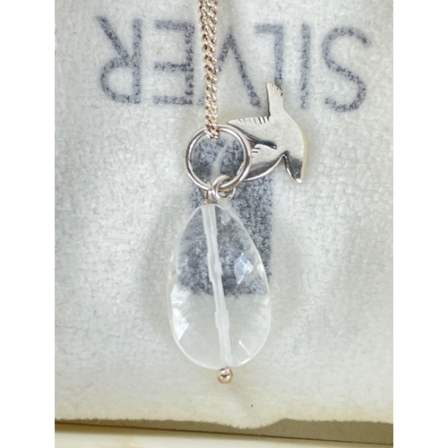 23 - A delicate boxed 925 stamped 'SIMPLY SILVER' silver pendant with chain with a charming crystal dropl... 