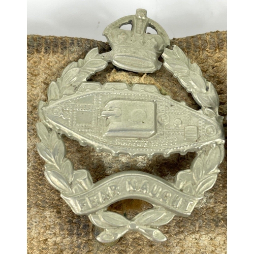 83 - Of military interest - a belt with fourteen badges and buttons including a BRITISH LIGHT INFANTRY 