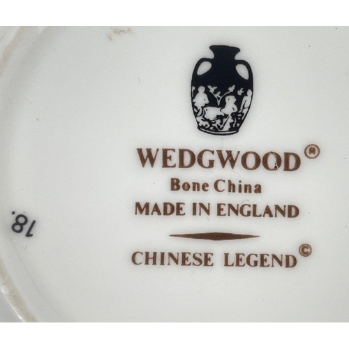 151 - A collection of WEDGWOOD 'Chinese Legend' to include a vase (18cm high), a vase (9cm high), a bud va... 