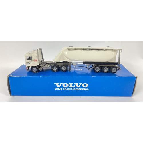 217 - A 1:50 CONRAD /NZG VOLVO F12 truck tanker trailer in mint condition, slight damage to box#59