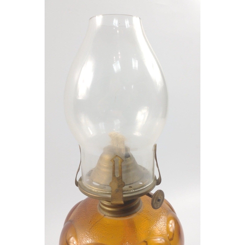 285 - An UNUSUAL ANTIQUE brown glass reservoir oil lamp c1920's, the brown glass stem is in twisted form w... 