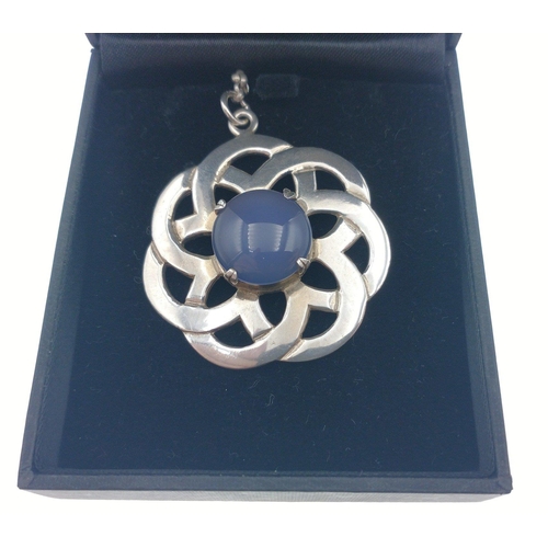 A vintage large Edinburgh silver pendant on a chain with a 4cm heather