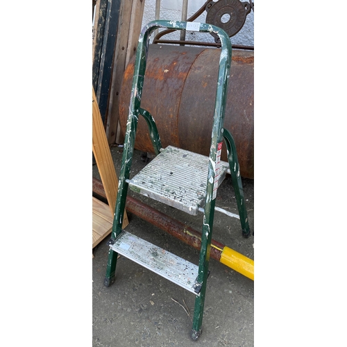 495 - A small ALUMINIUM &lsquo;A' frame two step household ladders with handy &lsquo; &lsquo; hold on to' ... 