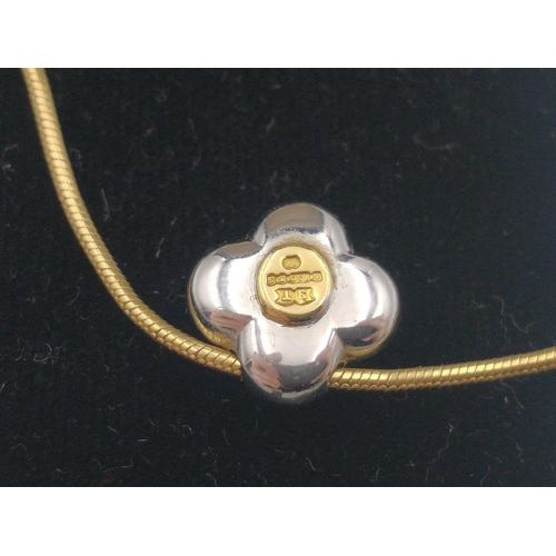 1 - BESPOKE HANDMADE JEWELLERY! 
A 750 stamped gold chain with a 750 Hallmarked white gold floral bundle... 