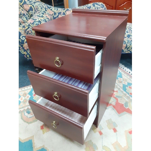 156 - A STAG style three drawer bedside cabinet#163