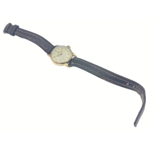 62 - Ladies VINTAGE Yellow Gold Hallmarked OMEGA hand wound wristwatch with brown leather strap - face di... 