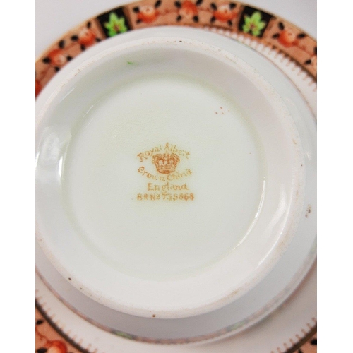 134 - A ROYAL ALBERT tea service (regd no 735868) to include 11 cups (1 cup has a hairline crack), 12 sauc... 