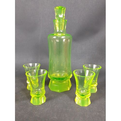 144 - Vintage URANIUM glass to include a small decanter (21cm tall approx), 4 shot glasses and 4 sundae di... 