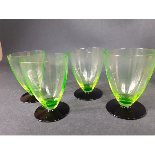 144 - Vintage URANIUM glass to include a small decanter (21cm tall approx), 4 shot glasses and 4 sundae di... 