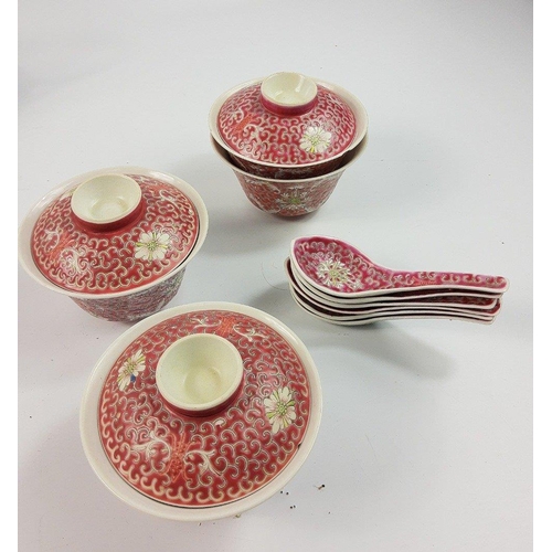 165 - An Oriental spring blossom design eggshell tea service with geisha's face visible in base of cups co... 