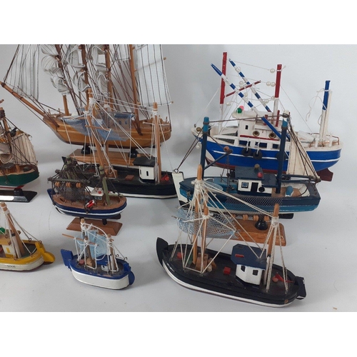 228 - SHIP AHOY !   A collection of 12 wooden model boats, largest 32cm approx.  Trawl the nets, you will ... 