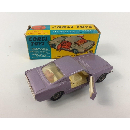 228C - CORGI 320 FORD MUSTANG FASTBACK 2+2 in original box. Lilac finish version in good condition complete... 