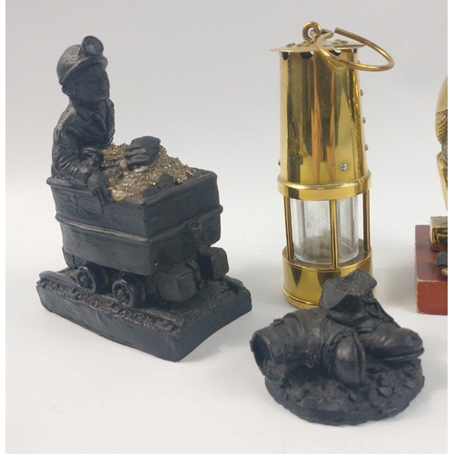 230 - A selection of miniature mining items including a brass PROTECTOR LAMP (12cm tall), two BRASS FIGURE... 