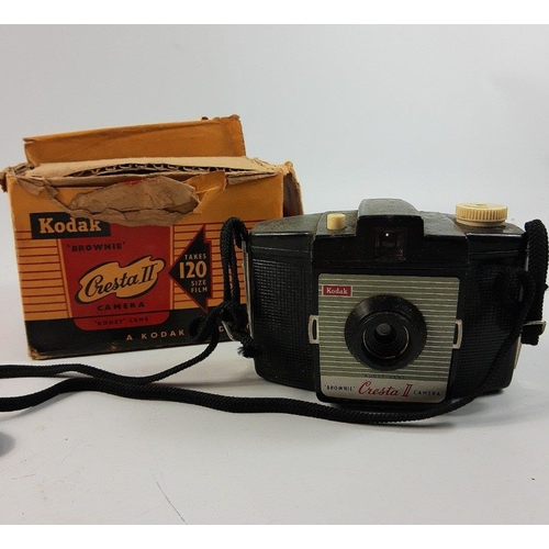 281 - Easy-go digital video camera and a Kodak Brownie Cresta II camera and a flashguard#301