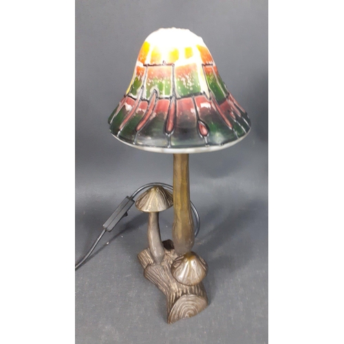 297 - An attractive FEATURE electric mushroom lamp with a heavy metal base standing 32cm high approx#317... 