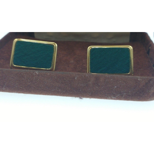 33 - Two sets of nice quality cufflinks in 'yellow metal', one pair with green stones and the other with ... 