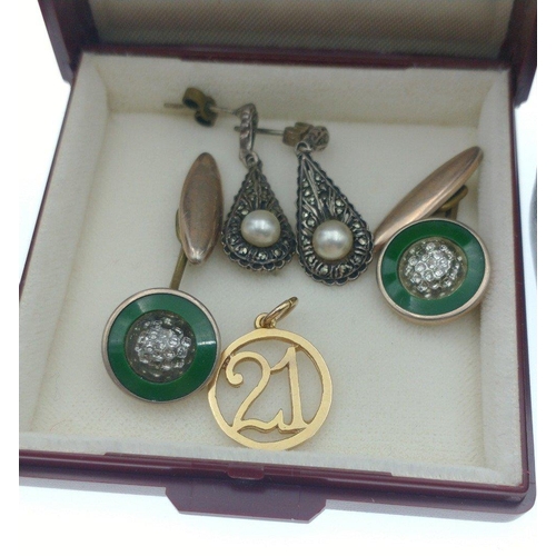 33 - Two sets of nice quality cufflinks in 'yellow metal', one pair with green stones and the other with ... 