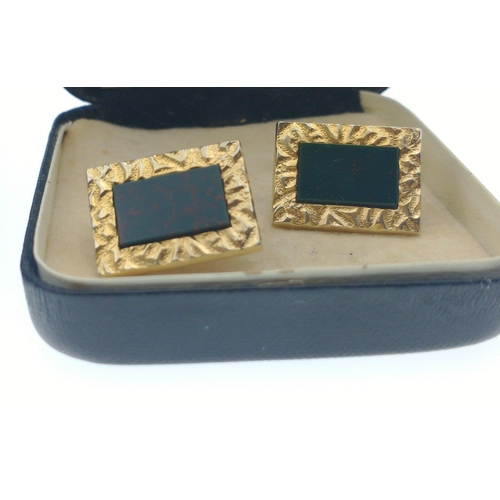 33 - Two sets of nice quality cufflinks in 'yellow metal', one pair with green stones and the other with ... 