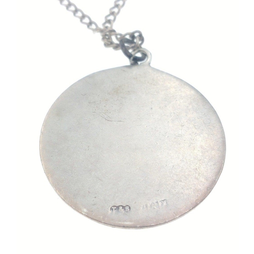 35 - A large silver stamped St Christopher pendant (3cm dia)  on a white metal chain, gross weight 18.90 ... 