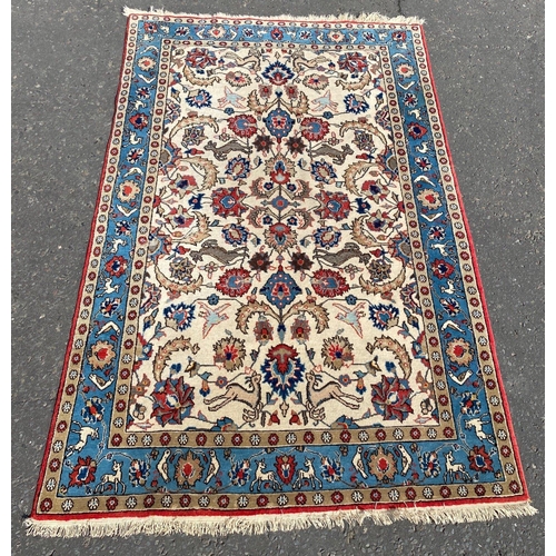 357 - One large Iranian handmade carpet - there is light damage in two small areas of thisSTUNNING Iranian... 