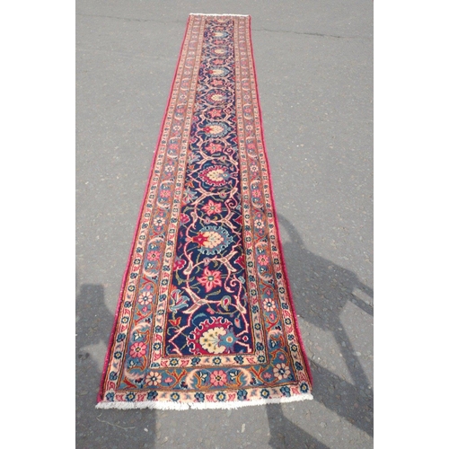 360 - An ESTHAN PERSIAN handmade woolen runner - dimensions 325cm x 55cm - in beautiful condition and prof... 