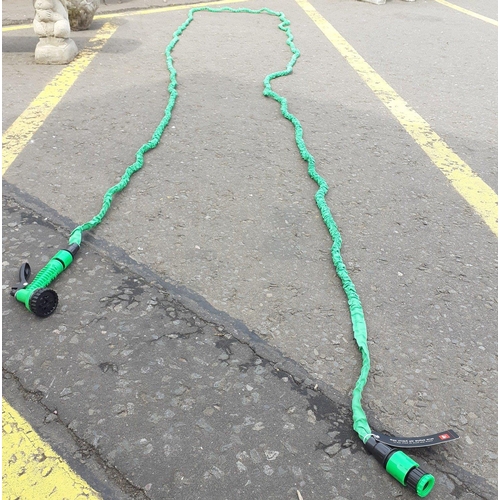 472 - A BRAND NEW Cotton Traders expanding  garden hose - this expands to 3 times its length when water en... 