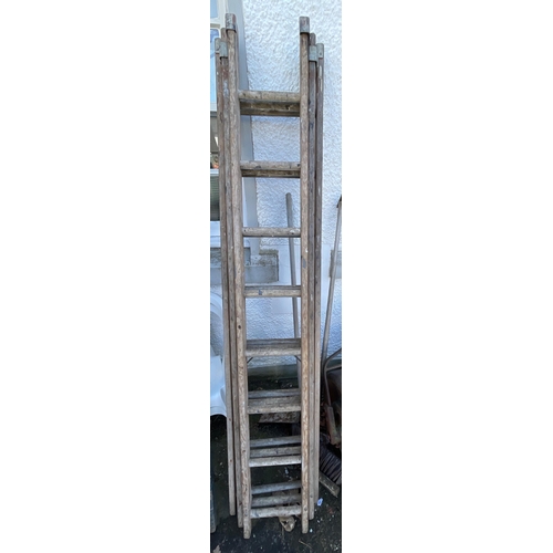 478 - A VINTAGE triple set of extending wooden ladders 24 step#505