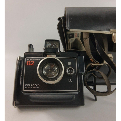 506 - A collection of vintage cameras to include a BROWNIE REFLEX made in the USA by EASTMAN KODAC CO, ROC... 