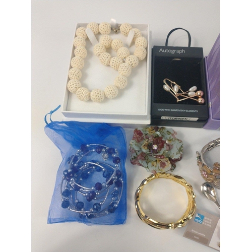 55 - Statement piece costume jewellery to include 3 bangles by M&S Autograph, a large floral bangle, ... 