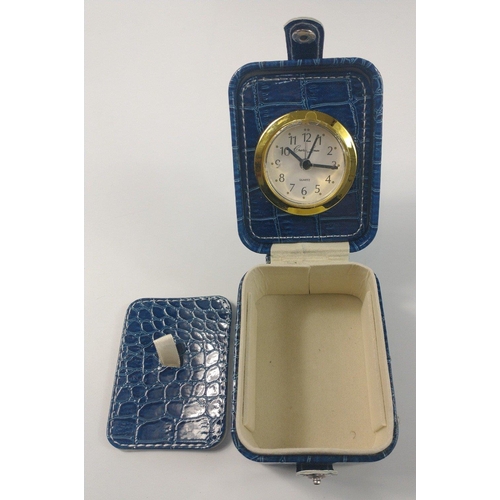 63 - Two travel clocks by CHARLES LEMAN with faux blue leather covers (9x7x6cm) - unused!#66