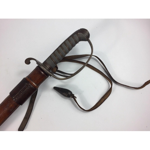 98 - 1821 Pattern British Army Artillery Officers sword in original tan leather covered scabbard.  Blade ... 