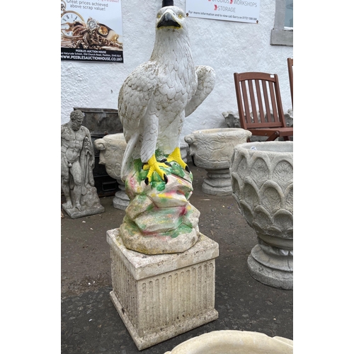 468 - IMPRESSIVE!! A perched garden GOLDEN EAGLE on a stone effect plinth - total combined height 86cm x 2... 