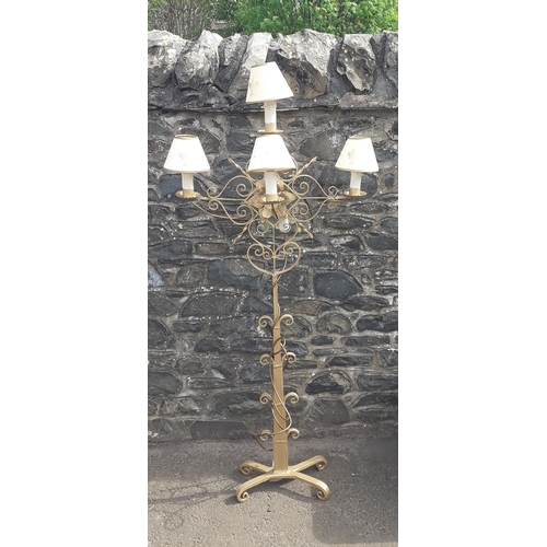 621 - SUBSTANTIAL Gilded 4 bulb electric floor lamp with scrolling metal design and shades. Stands approx ... 