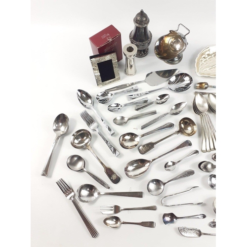 671 - A box lot of large amount of cutlery to include teaspoons, forks, knives, steak knives, a plated sug... 