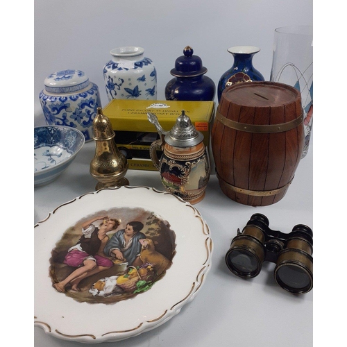 827 - A mixed lot to include a white metal coffee pot and hot water jug, a 2 tier cake plate, various pots... 