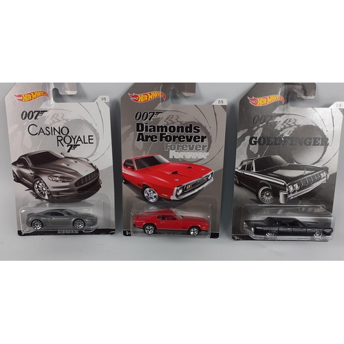 104 - JAMES BOND cars by HOT WHEELS - a complete set of 5 007 cars sealed in hanging display packaging to ... 