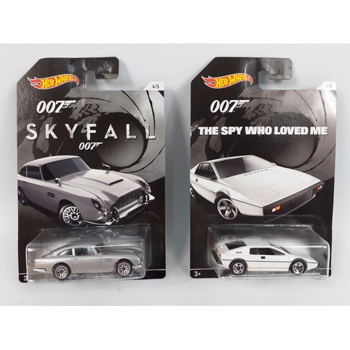 104 - JAMES BOND cars by HOT WHEELS - a complete set of 5 007 cars sealed in hanging display packaging to ... 