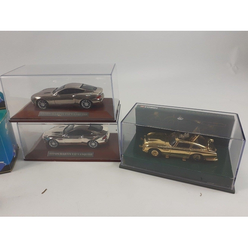 112 - A collection of JAMES BOND boxed model cars to include a CORGI Citroen 2CV and a similar by SOLIDO a... 