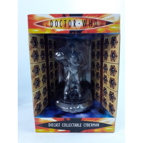 169 - DOCTOR WHO - a boxed blue Dalek money bank (slight damage to box)  and a boxed diecast collectable C... 